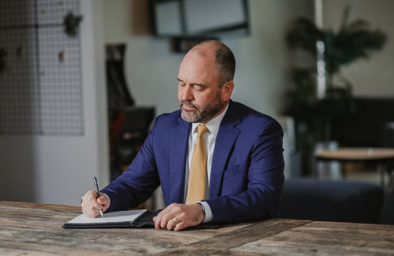 Jonathan Williams taking notes